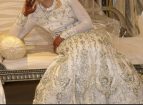 Elegant long sleeve white diamanté wedding gown