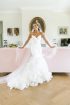 Strapless Mermaid Wedding Gown with Dramatic Ruffle Train