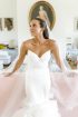 Strapless Mermaid Wedding Gown with Dramatic Ruffle Train